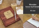 Wooden loose leaf binder